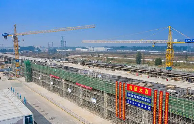 京雄快线雄州站封顶 “轨道上的京津冀”加速形成(图1) 3-2310200T2235K.jpg